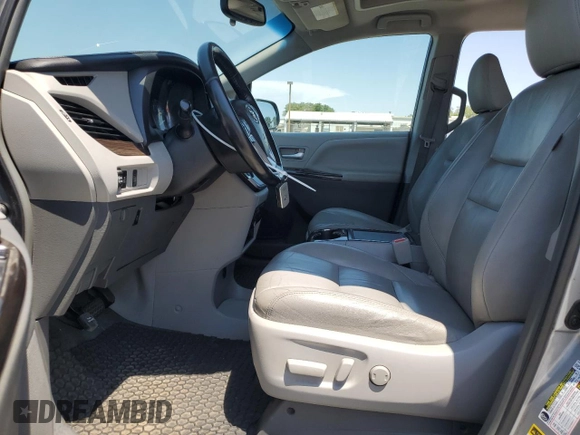 2015 Toyota Sienna XLE with VIN 5TDYK3DC4FS607026, listed as a Copart auction lot 60423605 with 132,327 mi miles and Clean title. Bid and sale history available at DreamBid. Image 7.