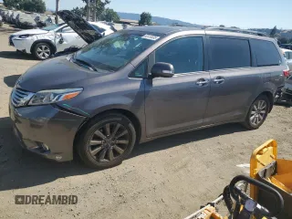 2015 Toyota Sienna Limited with VIN 5TDDK3DC7FS104041, listed as a Copart auction lot 62410335 with 112,755 mi miles and Salvage title. Bid and sale history available at DreamBid. Image 1.