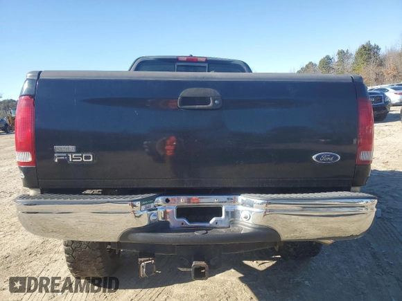 2000 Ford F-150 XL with VIN 1FTRF18LXYNB73341, listed as a Copart auction lot 41923645 with 194,094 mi miles and Salvage title. Bid and sale history available at DreamBid. Image 6.
