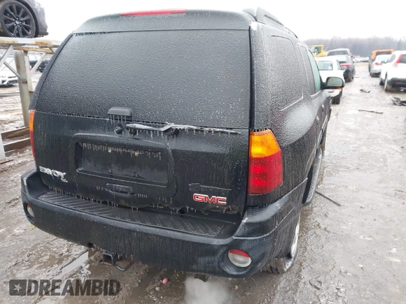 2005 GMC Envoy XL SLE with VIN 1GKET16S156160473, listed as a IAAI auction lot 41510661 with 233,942 mi miles. Bid and sale history available at carsss.com. Image 4.