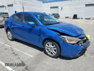 2016 Scion iA z VIN 3MYDLBZV6GY141028, wystawiony jako Copart lot #55264655 z przebiegiem 110 327 mil mil oraz Czysty tytuł • Clean title. Historia ofert i sprzedaży dostępna na DreamBid. Obrazek 4.