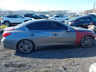 2014 Infiniti Q50 Sport with VIN JN1BV7AR9EM693864, listed as a IAAI auction lot 42050681 with 115,967 mi miles and . Bid and sale history available at carsss.com. Image 13.