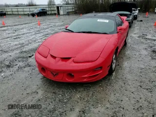 1998 Pontiac Firebird Formula z VIN 2G2FV22G4W2200991, wystawiony jako Copart lot #84553624 z przebiegiem 129 605 mil mil oraz Szkoda całkowita • Salvage title. Historia ofert i sprzedaży dostępna na DreamBid. Obrazek 10.