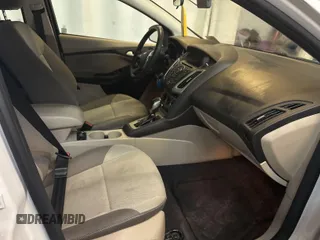 2014 Ford Focus SE with VIN 1FADP3F27EL443121, listed as a IAAI auction lot 42061277 with 73,585 mi miles. Bid and sale history available at carsss.com. Image 1.