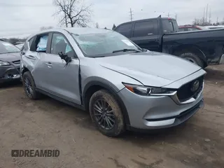 2021 Mazda CX-5 Touring with VIN JM3KFBCM7M0356685, listed as a IAAI auction lot 41136689 with 45,224 mi miles. Bid and sale history available at carsss.com. Image 1.