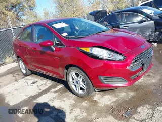 2017 Ford Fiesta SE z VIN 3FADP4BJ6HM143379, wystawiony jako IAAI lot #40863748 z przebiegiem 77 325 mil mil oraz . Historia ofert i sprzedaży dostępna na DreamBid. Obrazek 1.