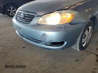 2006 Toyota Corolla CE with VIN 1NXBR32E66Z640879, listed as a Copart auction lot 60329235 with 129,294 mi miles and Salvage title. Bid and sale history available at DreamBid. Image 12.