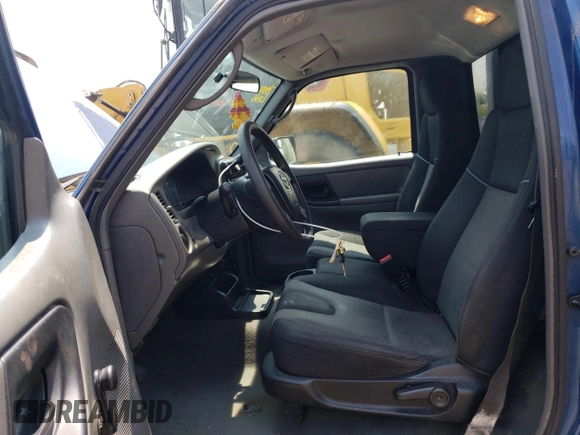 2007 Mazda B-Series Truck z VIN 4F4YR12D07PM06609, wystawiony jako Copart lot #58994565 z przebiegiem 280 733 mil mil oraz Czysty tytuł • Clean title. Historia ofert i sprzedaży dostępna na DreamBid. Obrazek 7.