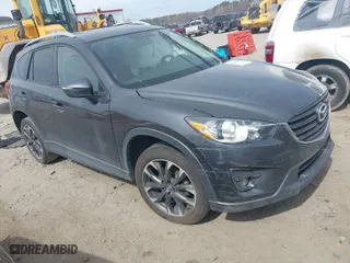 2016 Mazda CX-5 Grand Touring with VIN JM3KE4DY9G0845707, listed as a IAAI auction lot 41709685 with 96,351 mi miles. Bid and sale history available at carsss.com. Image 1.