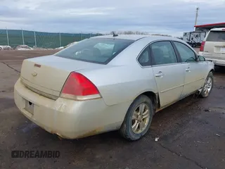 2013 Chevrolet Impala LS with VIN 2G1WF5E31D1154096, listed as a IAAI auction lot 41649749 with 204,860 mi miles and . Bid and sale history available at DreamBid. Image 4.