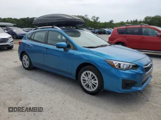 2017 Subaru Impreza Premium with VIN 4S3GTAD69H3723771, listed as a Copart auction lot 55430675 with 27,451 mi miles and Salvage title. Bid and sale history available at DreamBid. Image 4.