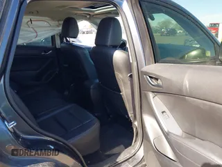 2014 Mazda CX-5 Grand Touring with VIN JM3KE4DY1E0364685, listed as a IAAI auction lot 41665349 with 135,751 mi miles. Bid and sale history available at carsss.com. Image 8.