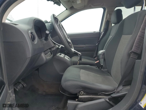 2014 Jeep Compass Sport with VIN 1C4NJCBA2ED708048, listed as a Copart auction lot 51190065 with 120,490 mi miles and Salvage Title. Bid and sale history available at carsss.com. Image 7.