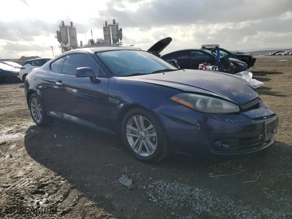 2007 Hyundai Tiburon GS with VIN KMHHM66D37U249105, listed as a Copart auction lot 42967305 with 137,844 mi miles and Salvage Title. Bid and sale history available at carsss.com. Image 4.