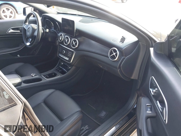 2019 Mercedes-Benz CLA 250 with VIN WDDSJ4GB9KN721403, listed as a IAAI auction lot 42233493 with 61,890 mi miles and . Bid and sale history available at DreamBid. Image 5.
