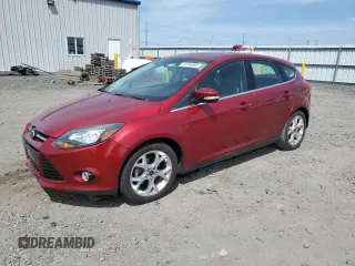 2014 Ford Focus Titanium with VIN 1FADP3N21EL421469, listed as a Copart auction lot 59744685 with 68,436 mi miles and Salvage title. Bid and sale history available at DreamBid. Image 1.