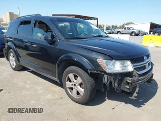 2012 Dodge Journey SXT z VIN 3C4PDDBG0CT300469, wystawiony jako IAAI lot #42467233 z przebiegiem 127 420 mil mil oraz . Historia ofert i sprzedaży dostępna na DreamBid. Obrazek 1.