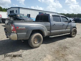 2014 Toyota Tacoma with VIN 5TFMU4FN3EX025697, listed as a Copart auction lot 62146895 with 133,028 mi miles and Salvage title. Bid and sale history available at DreamBid. Image 3.