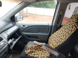 2005 Honda Odyssey EX-L with VIN 5FNRL38735B031513, listed as a IAAI auction lot 42197247 with 276,584 mi miles and . Bid and sale history available at DreamBid. Image 5.