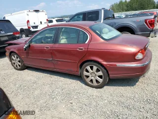 2006 Jaguar X-Type with VIN SAJWA51A16WE85139, listed as a Copart auction lot 66423084 with 137,318 mi miles and Salvage Title. Bid and sale history available at carsss.com. Image 2.