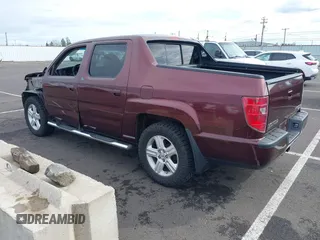 2009 Honda Ridgeline RTL with VIN 5FPYK16539B101836, listed as a IAAI auction lot 41894409 with 185,325 mi miles. Bid and sale history available at carsss.com. Image 3.