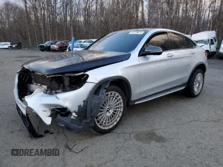 2019 Mercedes-Benz GLC with VIN WDC0J4KBXKF640858, listed as a Copart auction lot 87378814 with 67,392 mi miles and Salvage Title. Bid and sale history available at carsss.com. Image 1.