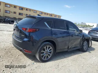 2021 Mazda CX-5 Grand Touring with VIN JM3KFBDM4M1462570, listed as a Copart auction lot 54827675 with 45,389 mi miles and Salvage Title. Bid and sale history available at DreamBid. Image 3.