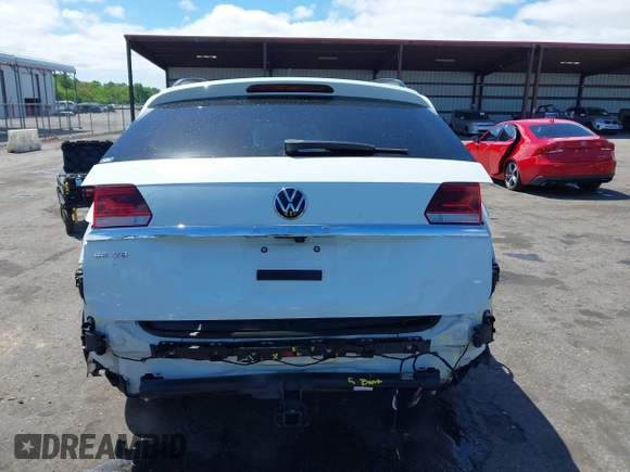 2021 Volkswagen Atlas SE z VIN 1V2WR2CA2MC529355, wystawiony jako IAAI lot #41972048 z przebiegiem 63 970 mil mil oraz . Historia ofert i sprzedaży dostępna na DreamBid. Obrazek 16.