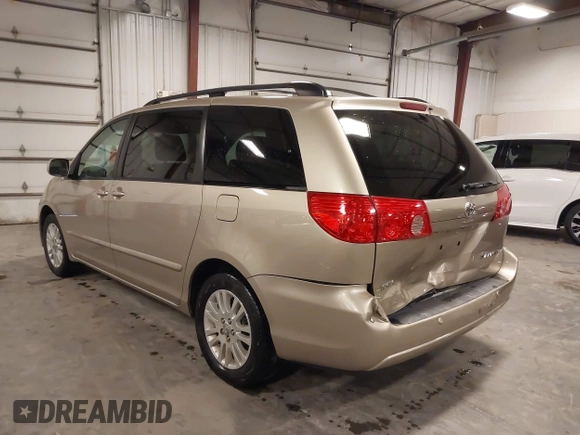 2009 Toyota Sienna XLE with VIN 5TDZK22CX9S236850, listed as a IAAI auction lot 42303935 with 201,583 mi miles and . Bid and sale history available at DreamBid. Image 3.