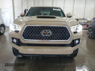 2019 Toyota Tacoma SR z VIN 3TMCZ5AN1KM285074, wystawiony jako Copart lot #53545975 z przebiegiem 53 838 mil mil oraz Szkoda całkowita • Salvage title. Historia ofert i sprzedaży dostępna na DreamBid. Obrazek 5.
