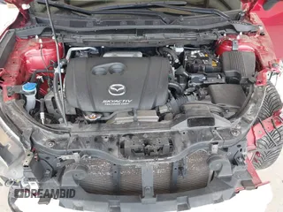 2016 Mazda CX-5 Grand Touring with VIN JM3KE4DY3G0688062, listed as a IAAI auction lot 42025169 with 59,867 mi miles and . Bid and sale history available at carsss.com. Image 10.