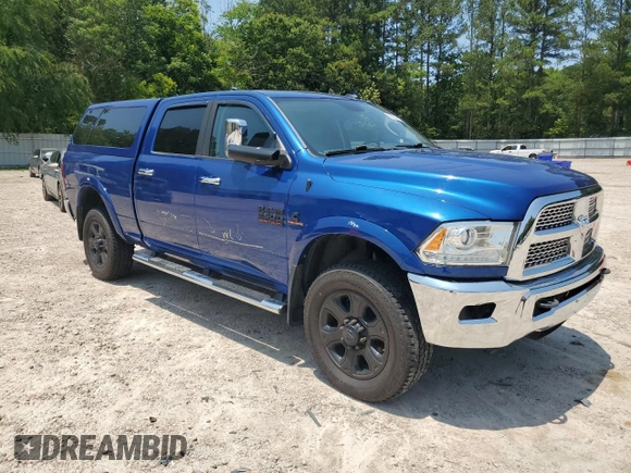2015 Ram 2500 Laramie with VIN 3C6UR5FL5FG582579, listed as a Copart auction lot 58382715 with 128,605 mi miles and Salvage title. Bid and sale history available at DreamBid. Image 4.