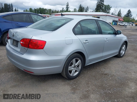 2012 Volkswagen Jetta TDI w/Premium & Nav with VIN 3VWLL7AJ8CM364248, listed as a IAAI auction lot 42292490 with 268,674 mi miles and . Bid and sale history available at DreamBid. Image 4.