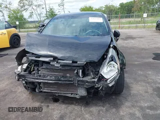2014 Kia Rio LX with VIN KNADM4A33E6335499, listed as a IAAI auction lot 42123085 with 148,146 mi miles and . Bid and sale history available at DreamBid. Image 6.