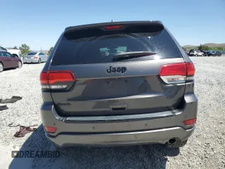 2018 Jeep Grand Cherokee Altitude with VIN 1C4RJFAG5JC320742, listed as a Copart auction lot 56988195 with 140,320 mi miles and Salvage title. Bid and sale history available at DreamBid. Image 6.