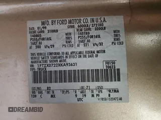 1999 Ford F-150 XL with VIN 1FTZX0722XKA93631, listed as a Copart auction lot 77263794 with Not provided miles and Salvage title. Bid and sale history available at DreamBid. Image 14.