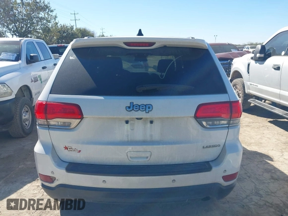 2018 Jeep Grand Cherokee Laredo E with VIN 1C4RJEAG2JC428990, listed as a IAAI auction lot 41218996 with 123,758 mi miles. Bid and sale history available at carsss.com. Image 17.