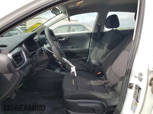 2021 Kia Rio LX with VIN 3KPA24AD1ME369454, listed as a Copart auction lot 50754405 with 81,458 mi miles and Salvage Title. Bid and sale history available at DreamBid. Image 7.