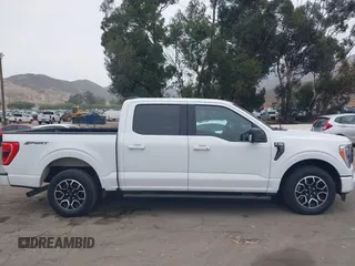 2021 Ford F-150 XL with VIN 1FTEW1CP7MKE89476, listed as a IAAI auction lot 42299954 with 152,473 mi miles and . Bid and sale history available at DreamBid. Image 13.