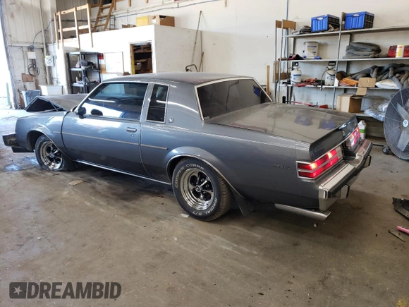 1987 Buick Regal with VIN 1G4GJ11Y4HP413978, listed as a Copart auction lot 72449154 with 52,519 mi miles and Salvage Title. Bid and sale history available at DreamBid. Image 2.