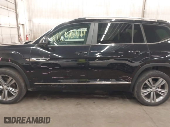 2018 Volkswagen Atlas SEL z VIN 1V2RR2CAXJC548261, wystawiony jako IAAI lot #41650478 z przebiegiem 123 399 mil mil oraz . Historia ofert i sprzedaży dostępna na DreamBid. Obrazek 15.