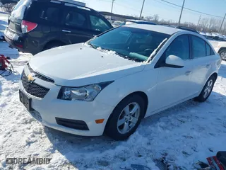 2013 Chevrolet Cruze 1LT with VIN 1G1PC5SB2D7262190, listed as a IAAI auction lot 41314526 with 116,117 mi miles. Bid and sale history available at carsss.com. Image 2.