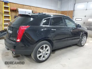 2012 Cadillac SRX Premium Collection with VIN 3GYFNFE33CS643354, listed as a Copart auction lot 61646135 with 131,177 mi miles and Clean title. Bid and sale history available at DreamBid. Image 3.