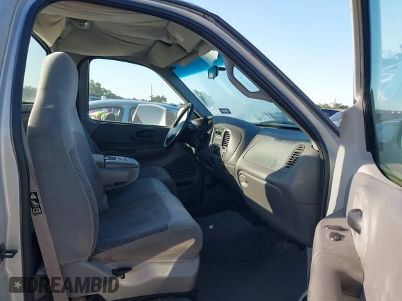 1999 Ford F-150 with VIN 1FTZF1727XKA60617, listed as a IAAI auction lot 41980403 with 98,481 mi miles and . Bid and sale history available at DreamBid. Image 5.