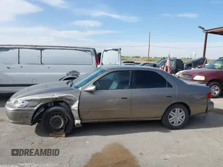 2001 Toyota Camry CE z VIN 4T1BG22K31U069513, wystawiony jako IAAI lot #42243673 z przebiegiem 137 241 mil mil oraz . Historia ofert i sprzedaży dostępna na DreamBid. Obrazek 14.