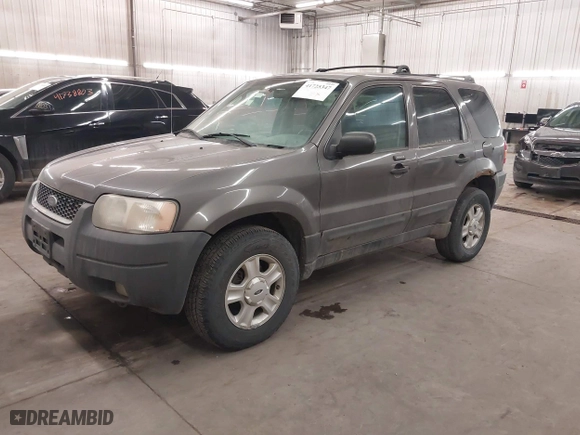 2004 Ford Escape XLT with VIN 1FMYU93174KA69760, listed as a IAAI auction lot 41725347 with 232,740 mi miles. Bid and sale history available at carsss.com. Image 2.