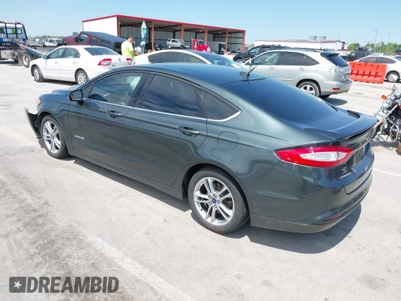 2015 Ford Fusion SE Hybrid with VIN 3FA6P0LU7FR224823, listed as a IAAI auction lot 42199479 with 81,835 mi miles and . Bid and sale history available at DreamBid. Image 3.