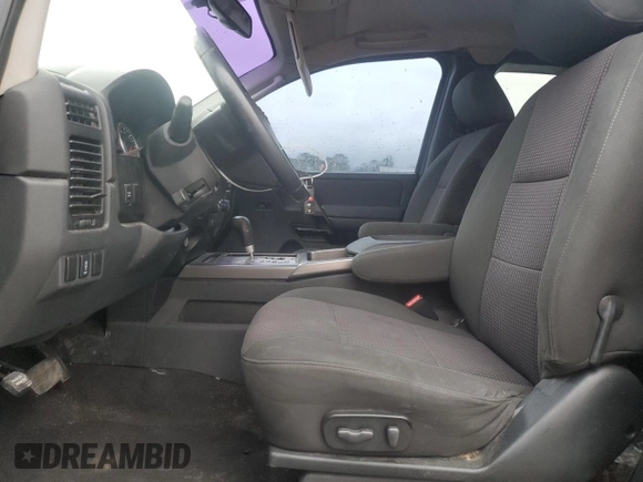 2010 Nissan Titan SE with VIN 1N6AA0CA4AN325984, listed as a Copart auction lot 48220805 with 191,926 mi miles and Salvage Title. Bid and sale history available at carsss.com. Image 7.