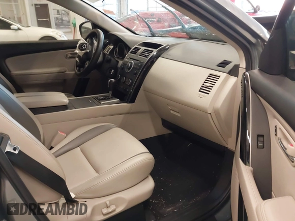 2011 Mazda CX-9 Touring with VIN JM3TB2CA2B0332314, listed as a IAAI auction lot 41077372 with 138,537 mi miles and . Bid and sale history available at DreamBid. Image 5.