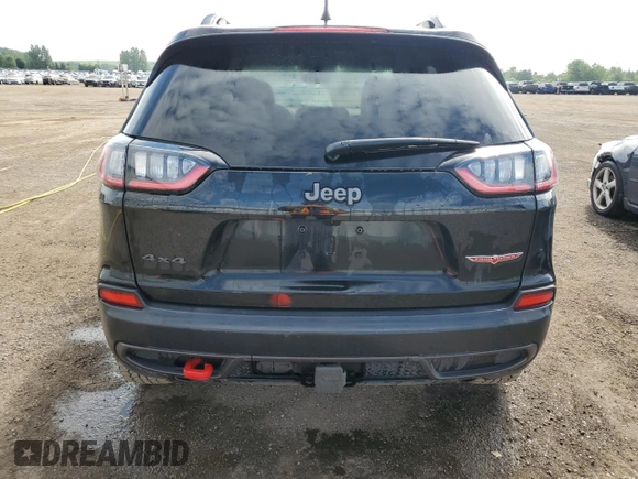 2022 Jeep Cherokee Trailhawk with VIN 1C4PJMBX3ND555098, listed as a Copart auction lot 58559374 with 0 mi miles and Salvage Title. Bid and sale history available at carsss.com. Image 6.